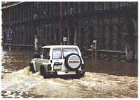 The car in a flooded street